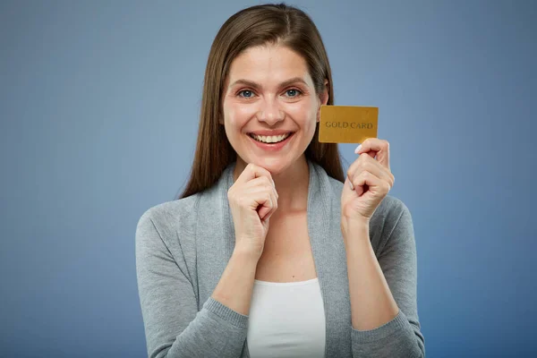 Happy woman with credit card isolated portrait.