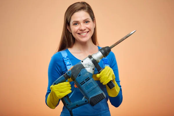 Woman Blue Overalls Holding Punching Machine Isolated Female Portrait — Stock Photo, Image