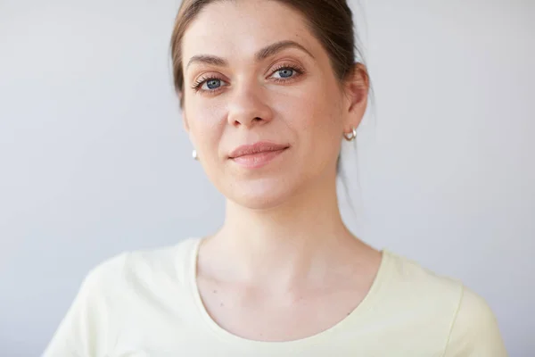 Focused thinking woman face portrait.  Female head shot with shallow depth of field.