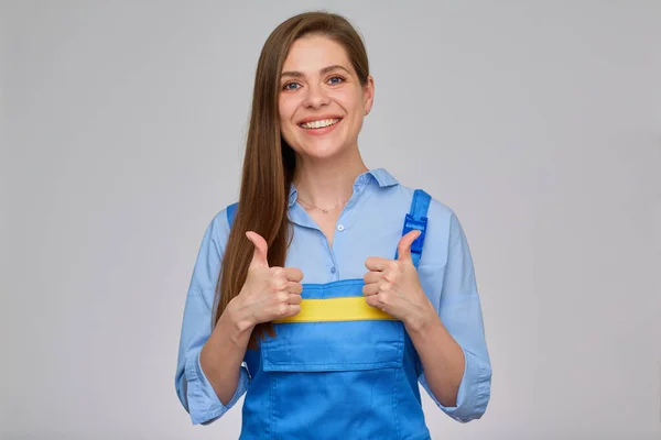 Gülümseyen Kadın Tesisatçı Mavi Tulumlu Sarı Çizgili Elitçi Thunb Gösteriyor — Stok fotoğraf