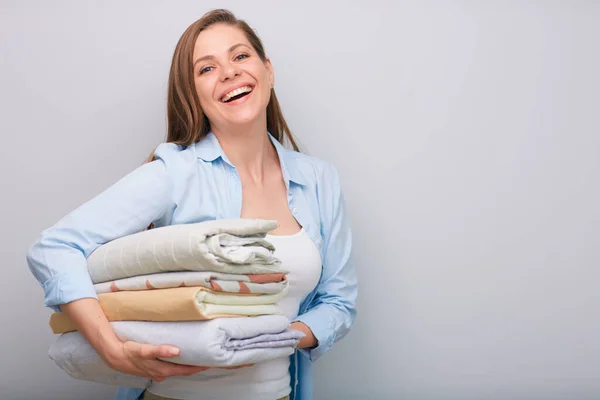Laughing Emotional Woman Mouth Open Holding Clothes Stack Bed Sheets — Stock Photo, Image