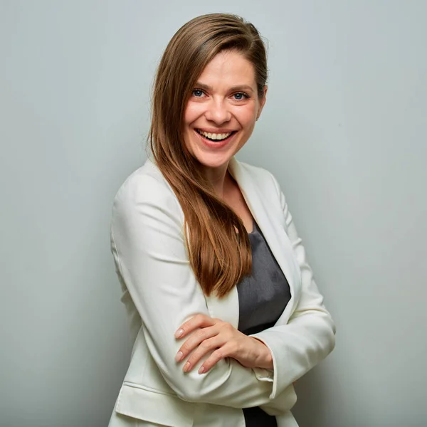 Smiling business woman in white suit isolated portrait.