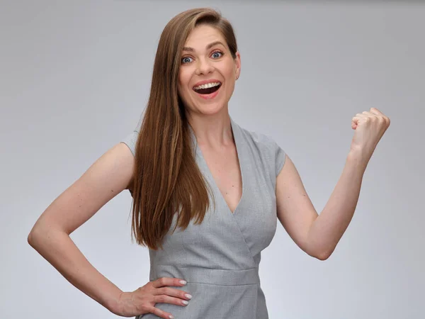 Woman power concept pose. Smiling business woman bends her arm, demonstrating her feminine strength. isolated portrait.