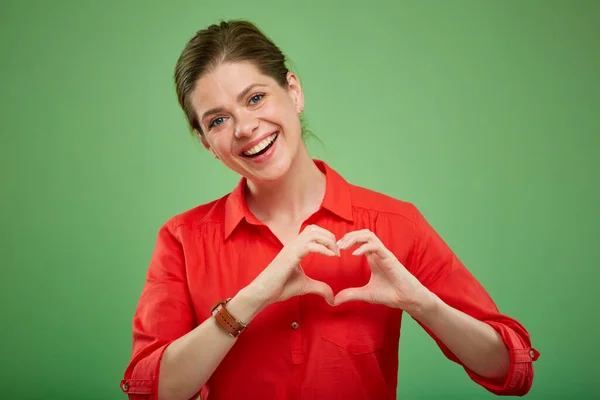 Woman Red Shirt Doing Heart Love Gesture Isolated Green — Stock Photo, Image