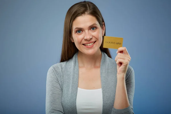 Happy woman with credit card isolated portrait.