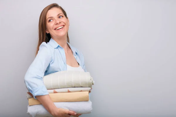 Smiling Woman Holding Clothes Bed Sheets Looking Away Shoulder Isolated — Stock Photo, Image