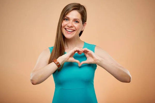 Smiling Woman Gesture Heart Fingers Isolated Portrait Yellow Brown Background — Stock Photo, Image