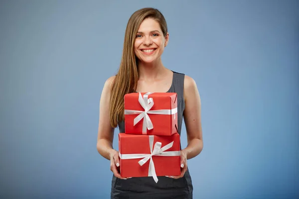 Business woman holding paper gift boxes.