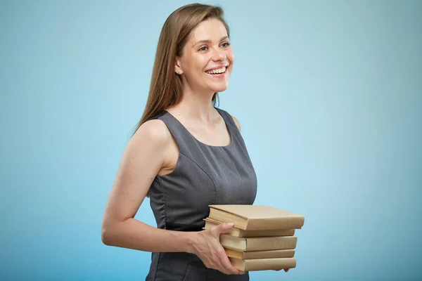 Teacher or business woman with books stack looking side away isolated portrait. Accountant worker.