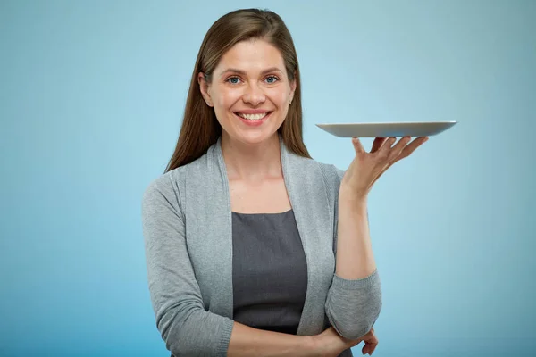 Smiling Woman Empty Plate Isolated Portrait Light Blue Back — Stock Photo, Image