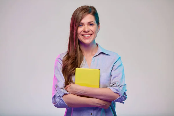 Profesora Sonriente Estudiante Feliz Sosteniendo Libro Amarillo Retrato Femenino Aislado —  Fotos de Stock