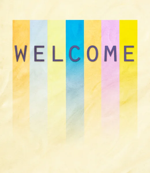 Welcome word on colorful textured paper — Stock Photo, Image