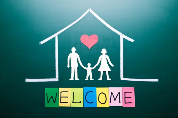 Palabra de bienvenida y familia en casa — Foto de Stock