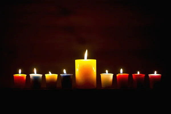 Series of candles with brown background — Stock Photo, Image