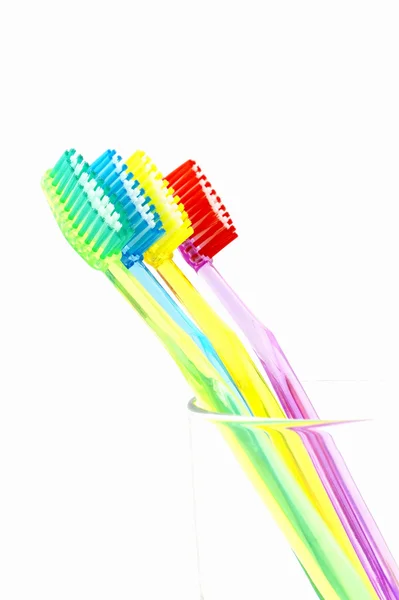 Colorful toothbrush in glass — Stock Photo, Image