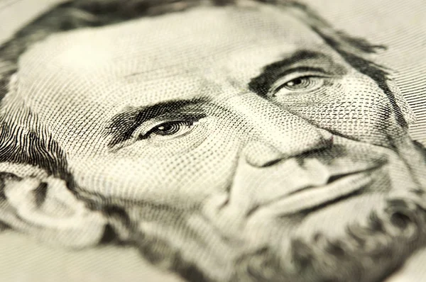 Portrait d'Abraham Lincoln sur les cinq dollars (macro photo ) — Photo