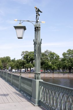 Lanterns on Ioanovskom to the bridge clipart