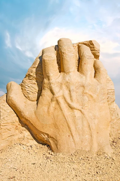 Shortlived sculpture from sand. Hand — Stock Photo, Image