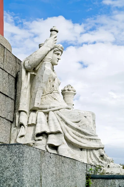 Statue of allegory of the river Neva at the rostral column. 1810 — Stock Photo, Image