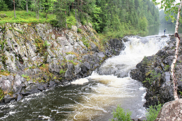A flat waterfall of Kivach is in Karelia