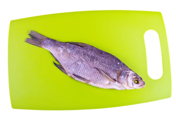 Cutting board in the kitchen and the dried bream — Stock Photo, Image