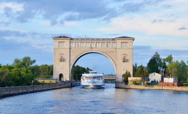 Sluice Gates on the River Volga, Russia with cruise boat clipart
