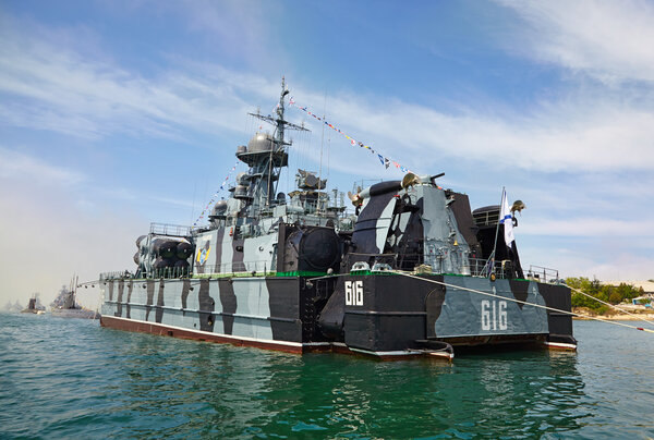 A modern warship in the parade