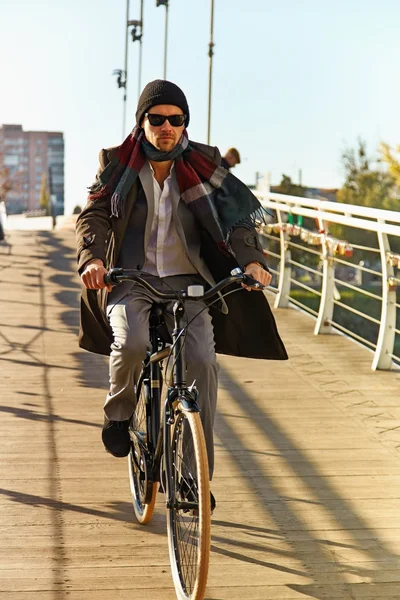 Young man riding a bicycle — Stock Photo, Image