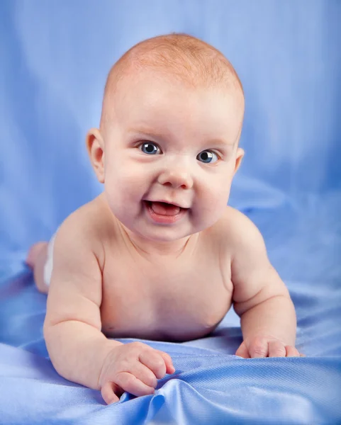 Baby girl on her stomach — Stock Photo, Image