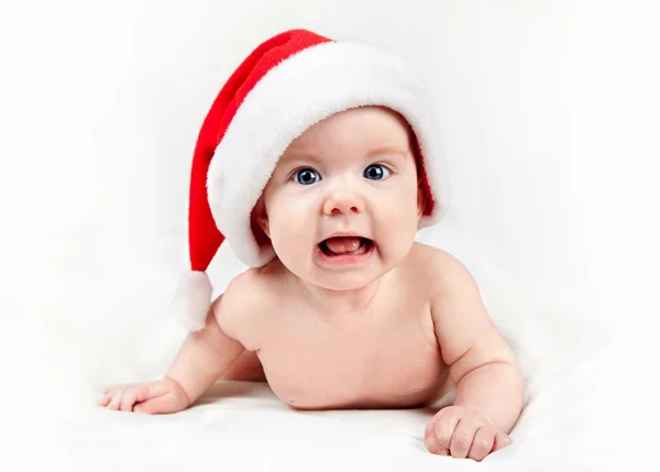 Baby in red Santa hat — Stock Photo, Image