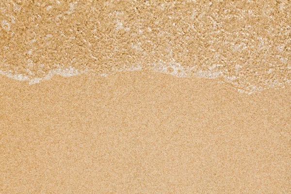 Wave on clear sand beach — Stock Photo, Image