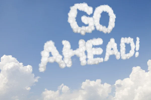 Go ahead concept text in clouds — Stock Photo, Image