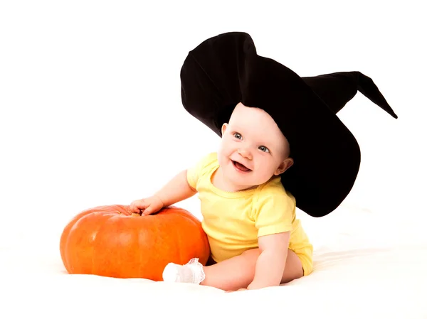 Baby with a pumpkin — Stock Photo, Image