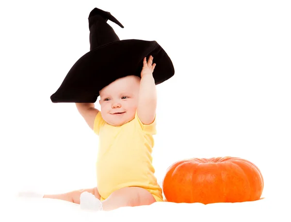 Baby with a pumpkin — Stock Photo, Image