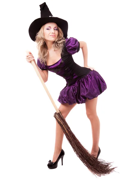 Witch with a broom — Stock Photo, Image