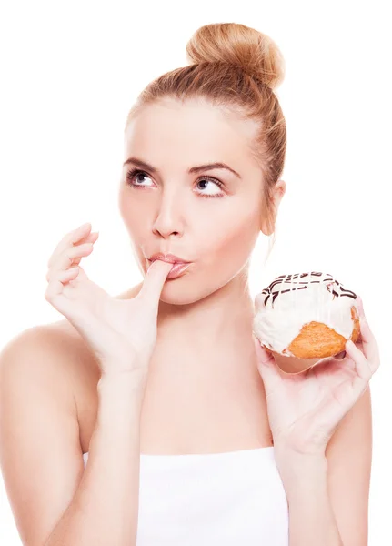 Woman eating a bun Royalty Free Stock Images