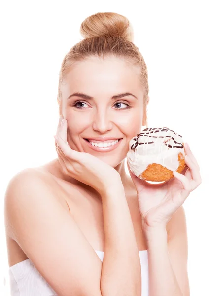 Woman eating a bun Royalty Free Stock Photos