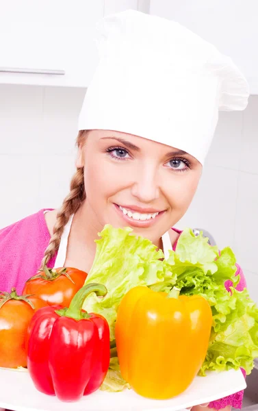 Cook with vegetables Royalty Free Stock Photos