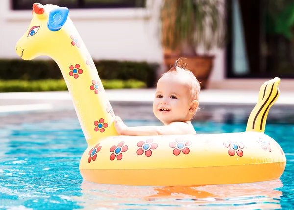 Baby with a float — Stock Photo, Image