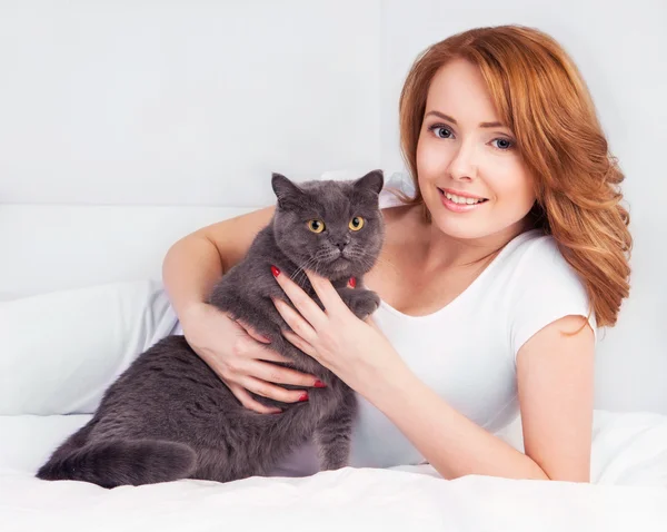 Woman with a cat Royalty Free Stock Photos