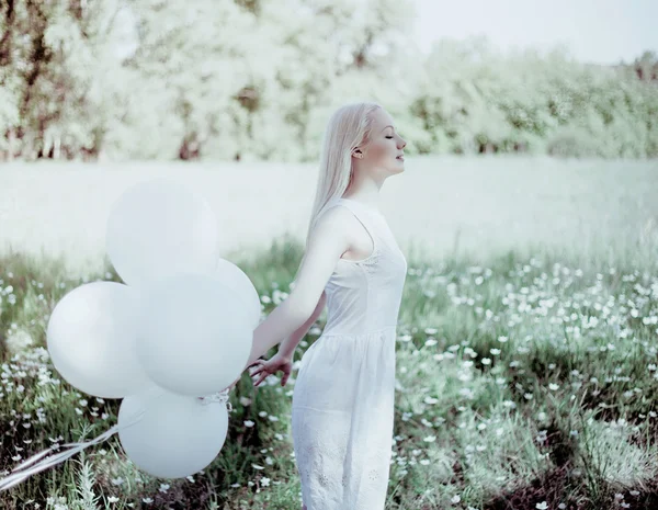 Γυναίκα με μπαλόνια — Φωτογραφία Αρχείου