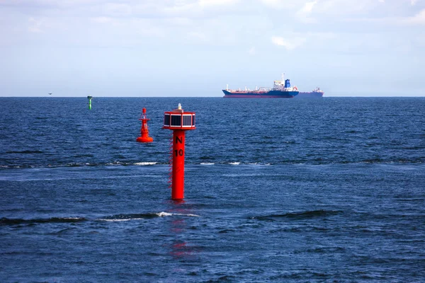 Cargo ships and buoy — Stock Photo, Image