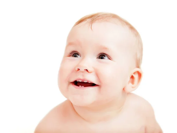 Niedliches glückliches Baby, das auf Weiß lächelt — Stockfoto