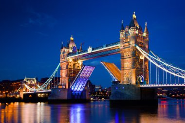 Tower Bridge in London, the UK at night clipart
