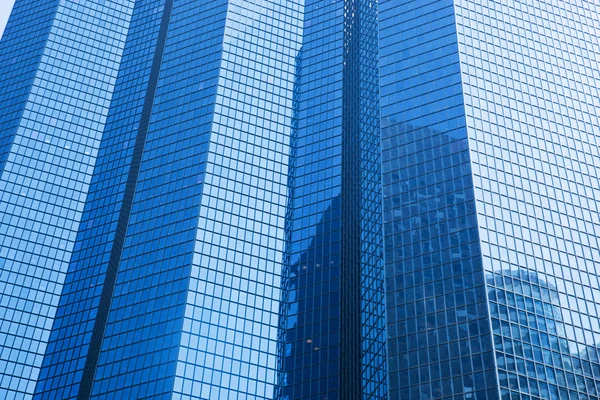 Business skyscrapers modern architecture in blue tint. — Stock Photo, Image