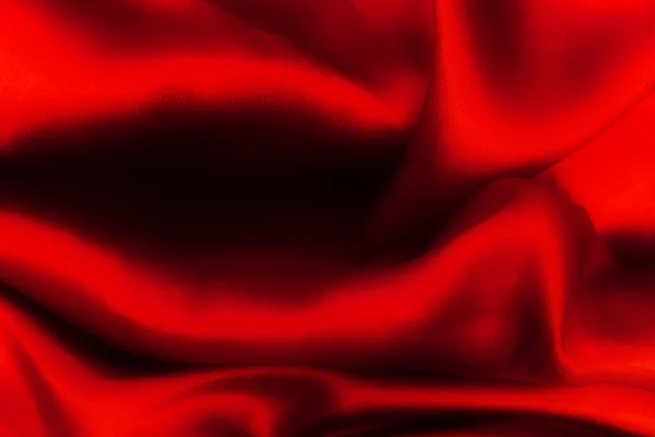 Vermelho dobrado fundo de cetim — Fotografia de Stock