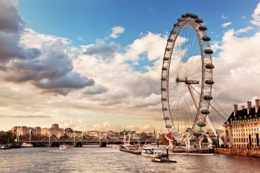 London, England the UK skyline. The London Eye clipart