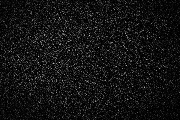 Black plastic background. Close up — Stock Photo, Image