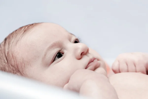 Bathing a young 3 month baby — Stock Photo, Image