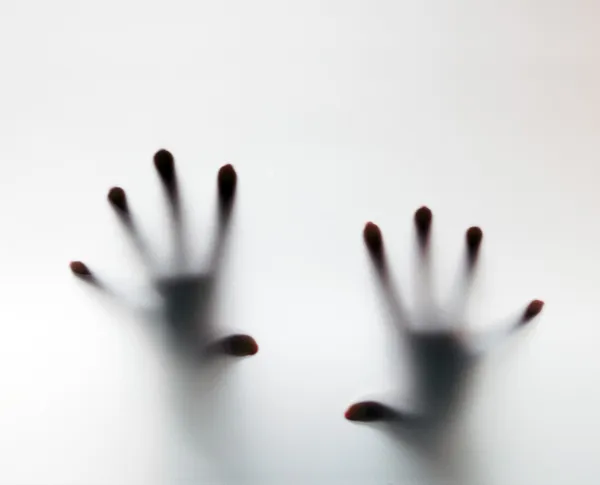 Hands touching frosted glass. Conceptual scream for help — Stock Photo, Image